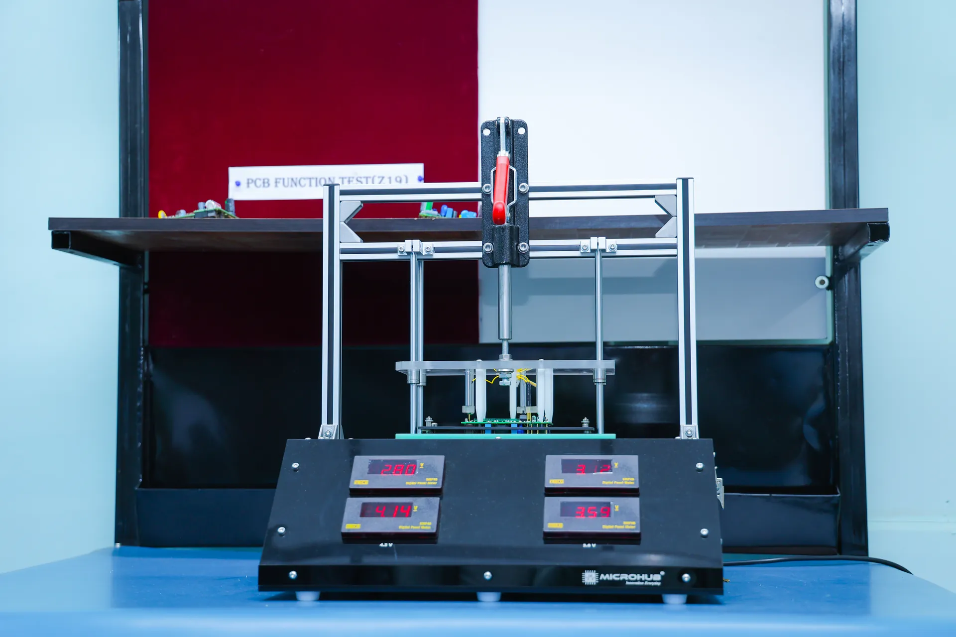 PCB function test jig verifying board-level voltages